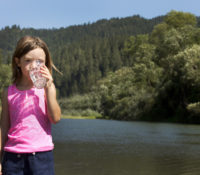Girl sips water at Russian River